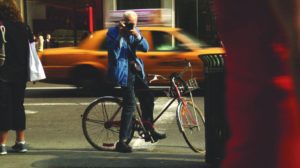 Bill Cunningham on bicycle